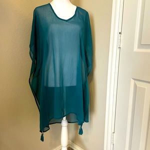 Women’s kane sol swim suit cover green with netted back Medium